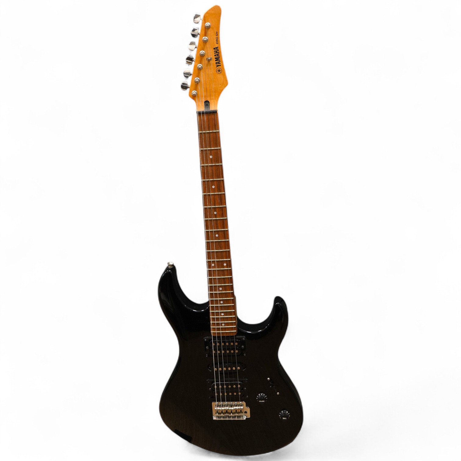 A Yamaha ERG121 electric guitar in black finish, with a soft gig case